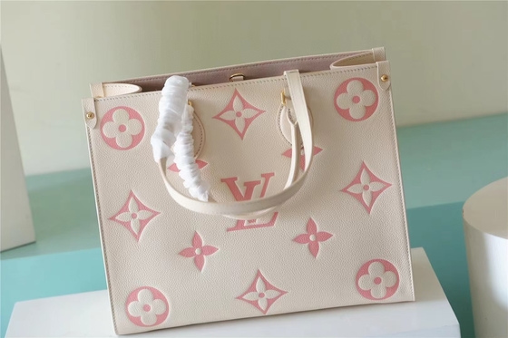 حقيبة يد صغيرة بتصميم شخصي من لويس فيتون Onthego Mm Monogram Empreinte