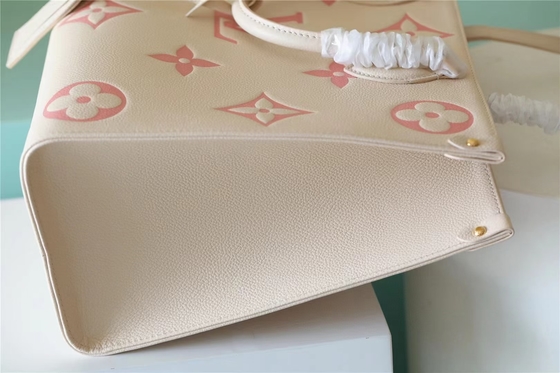 حقيبة يد صغيرة بتصميم شخصي من لويس فيتون Onthego Mm Monogram Empreinte