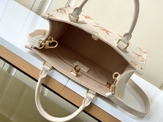 كريم الزعفران العملاق مونوغرام OnTheGo MM لويس فيتون Messenger Bag For iPad Mini